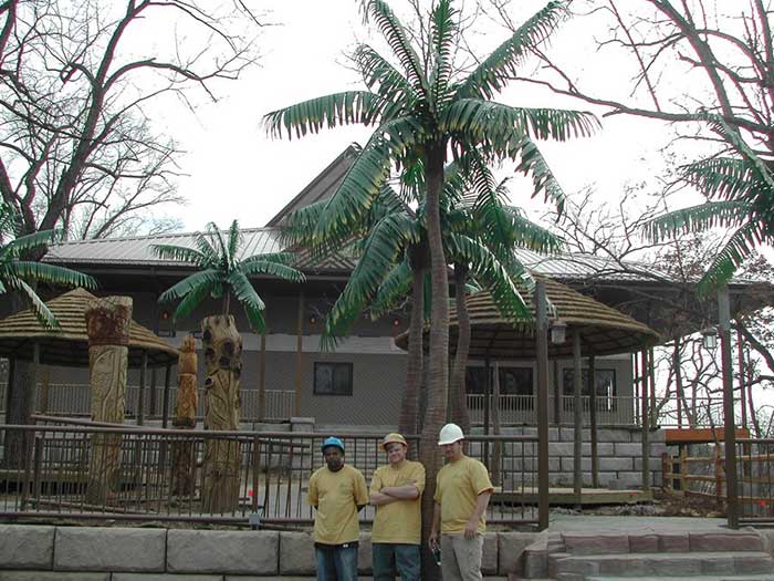 image of a fabricated palm tree and Custom Palm Tree workers