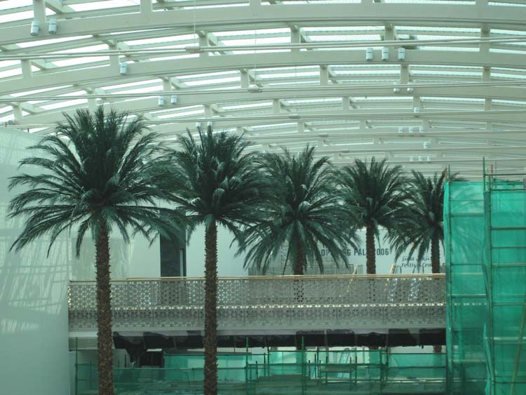 image of fabricated palm trees inside a building