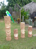 three custom made Tiki Poles depicting hawaiian gods